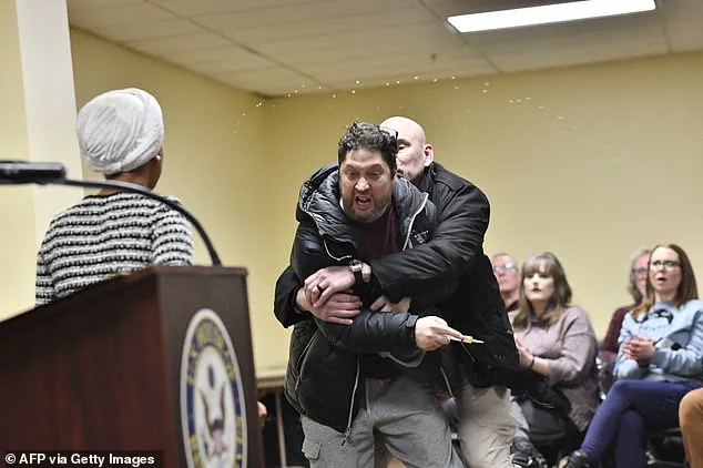 Breaking: Congresswoman Ilhan Omar Allegedly Sprayed with Unknown Liquid at Minneapolis Town Hall, Sparking Renewed Debate Over Safety of Public Political Discourse