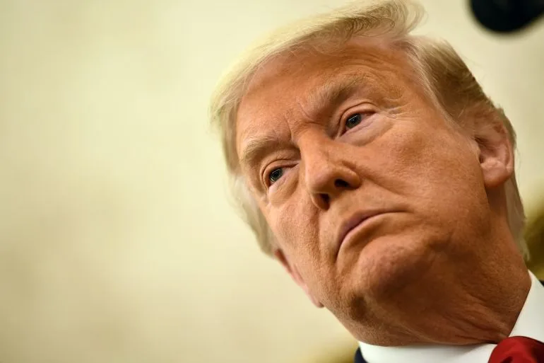 Trump's Controversial Foreign Policy Challenges Post-WWII Norms Amid Legal Criticism